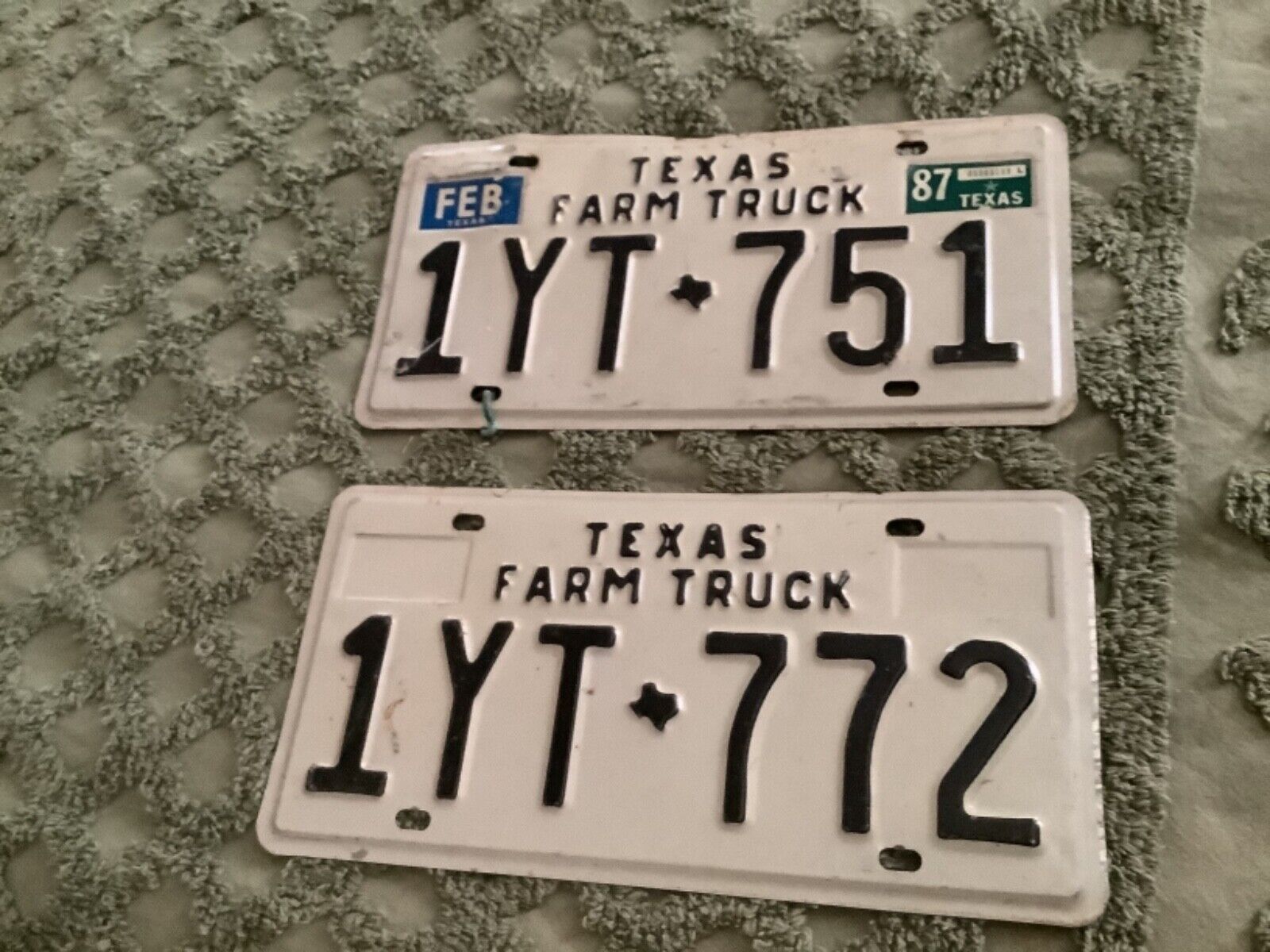 Vtg pair matching Texas Farm Truck issued license plates