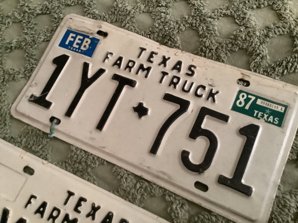 Vtg pair matching Texas Farm Truck issued license plates