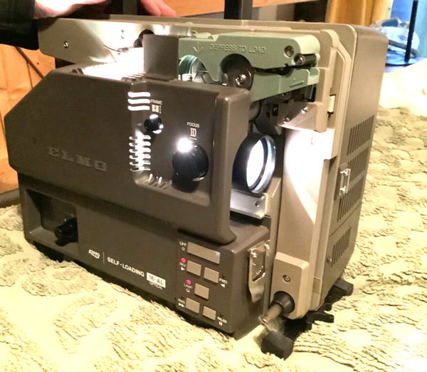 ELMO 16AL  16-Al 16mm Sound Film Projector Self Loading reel to reel works