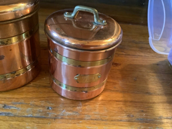 Set of four 4 copper brass clad storage canisters nesting vintage